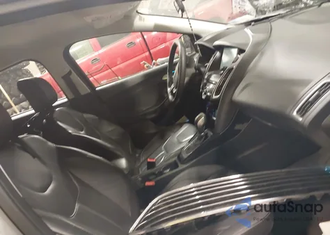 2015 Ford Focus Titanium from USA, damaged, VIN 1FADP3N27FL328473